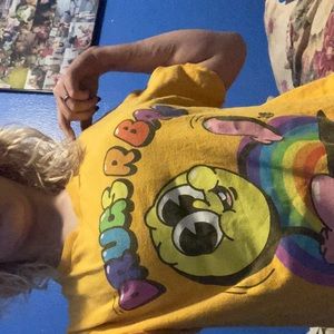 Shirt from Spencer’s”Drugs are bad”Yellow shirt with rainbow lettering.
